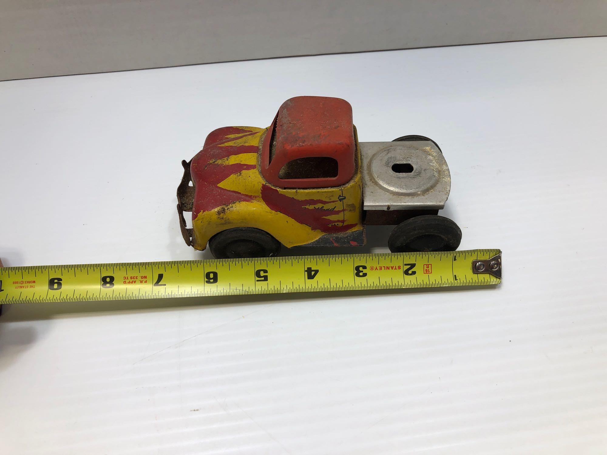 Yellow and red tin toy