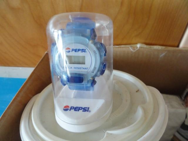 BOX LOT PEPSI MEMORBILLIA INCLUDING  DIGITAL WATCHES PLASTIC CUPS SALT AND