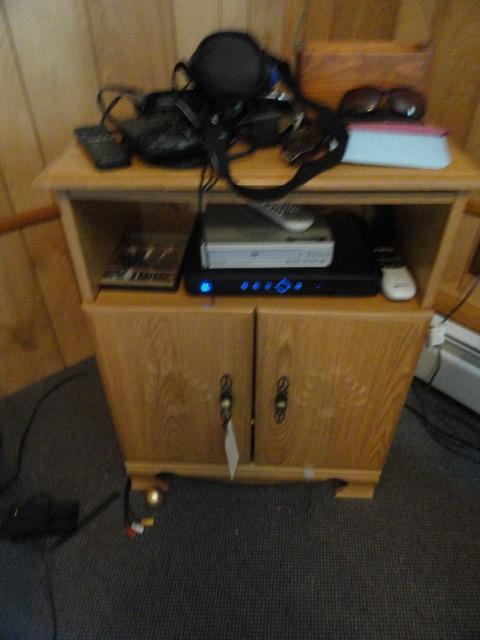 SMALL ENTERTAINMENT CENTER AND CONTENTS INCLUDING DVD PLAYER AND MORE