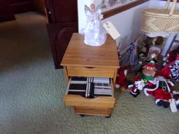 SMALL PINE SIX DRAWER CHEST FULL OF CASSETTES WITH DECORATIVE ANGEL