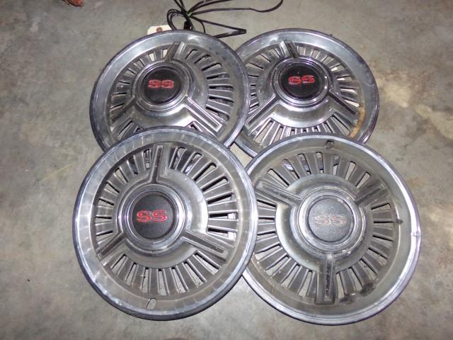 SET OF 4 SS HUBCAPS APPROX 14" ACROSS