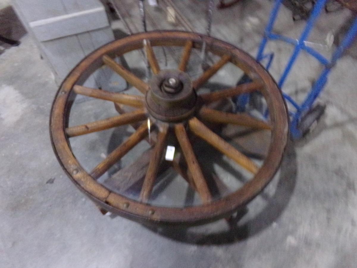 WOODEN WAGON WHEEL AND HUB CONVERTED TO TABLE APPROX 40 INCH ACROSS HEAVY