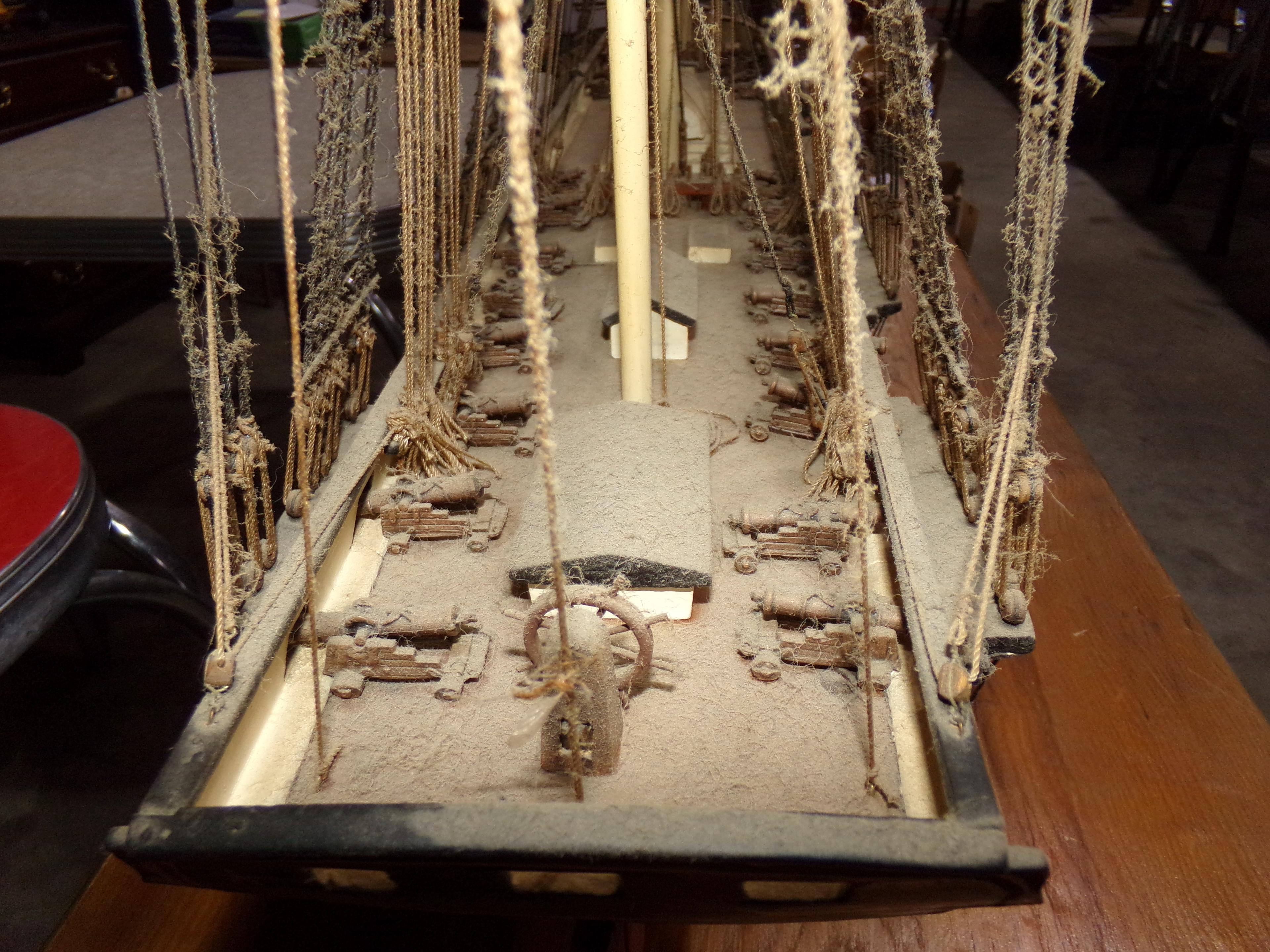 THREE MAST SCHOONER MODEL WITH CANNONS AND LIFE BOAT APPROX 50 INCH LONG X