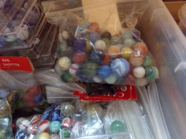 PLASTIC TOTE FULL OF COLLECTIBLE MARBLES