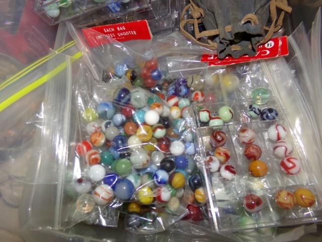 PLASTIC TOTE FULL OF COLLECTIBLE MARBLES