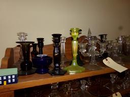 TOP SHELF INCLUDING CANDLE HOLDERS INCLUDING VASELINE GLASS EBONY GLASS AND