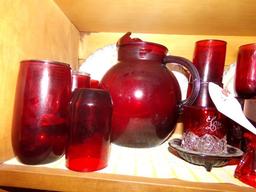 TOP SHELF OF HUTCH INCLUDING LARGE COLLECTION OF RUBY GLASS INCLUDING TUMBL