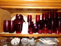 TOP SHELF OF HUTCH INCLUDING LARGE COLLECTION OF RUBY GLASS INCLUDING TUMBL