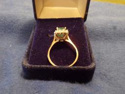 14 YELLOW GOLD RING WITH EMERALD AND 15 DIAMOND CHIPS 2.1 DWT