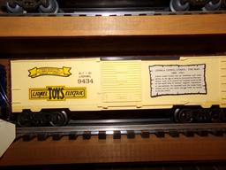 SET OF FOUR LIONEL BOX CARS INCLUDING GOLDEN YEARS 9433 COMMEMORATING 100TH