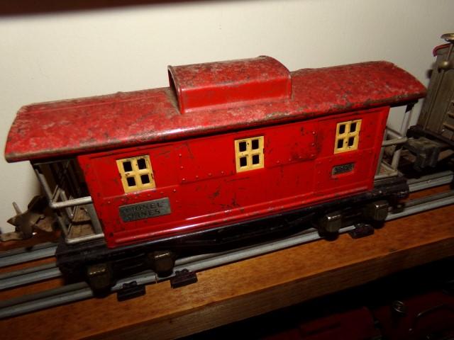 FOUR PCS LIONEL SHELL TANKER 2654 FLATBED 831 CABOOSE 657 LIVESTOCK 2655