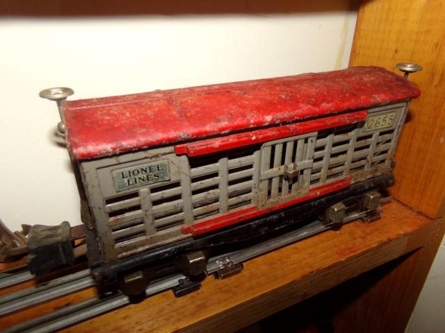 FOUR PCS LIONEL SHELL TANKER 2654 FLATBED 831 CABOOSE 657 LIVESTOCK 2655