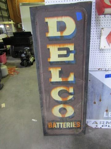 VINTAGE TIN DELCO BATTERIES SIGN APPROXIMATELY 62 X 24