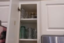 CONTENTS OF KITCHEN CABINETS INCLUDING MUGS AND CRYSTAL ICE BUCKET