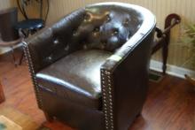 BROWN LEATHER ARM CHAIR