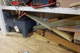 BOTTOM SHELF OF SHED INCLUDING EXTENSION CORDS OLD BOTTLES TOOLS LANTERN AN