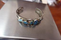 STERLING BRACELET WITH BLUE STONES .88 T OZ