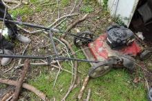 CONTENTS OF SMALL SHED INCLUDING PUSH MOWER GARDEN TOOLS GAS CANS WEED EATE