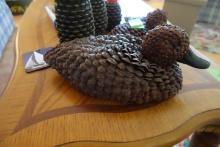 COLLECTION OF PINECONE DUCKS AND CANDLE HOLDERS