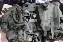 LARGE LOT MILITARY BACK PACKS AND CANVAS BAGS AND AMMO HOLDERS