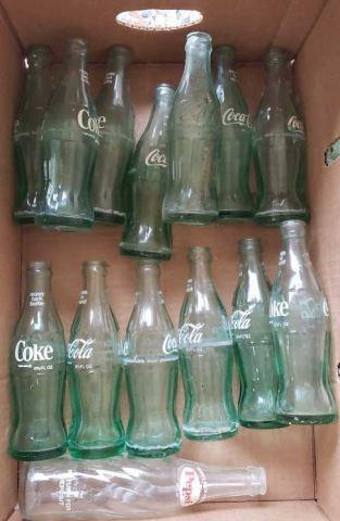 Assorted Coke Bottles