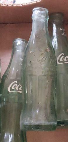 Assorted Coke Bottles