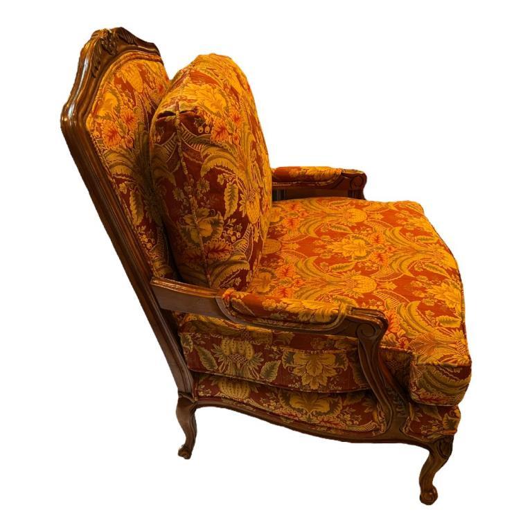 Carved Wood and Upholstered Arm Chair -