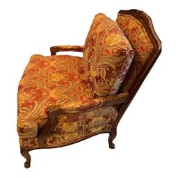 Carved Wood and Upholstered Arm Chair -