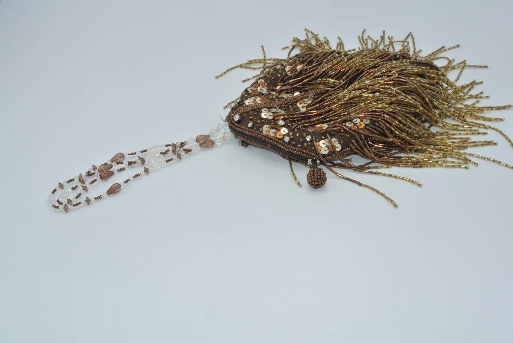 Brown, Long Beads Hand Purse Brown cloth purse with brown and gold beaded appliques and sequins, as