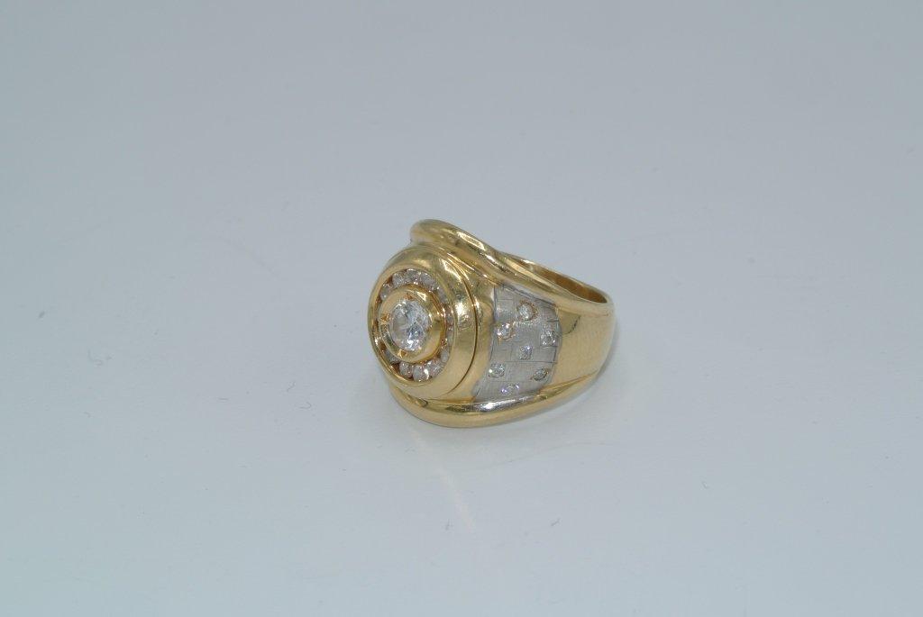 Gold colored ring with CZ stones Size 9 Men's gold colored metal ring with 14 CZ around one large CZ