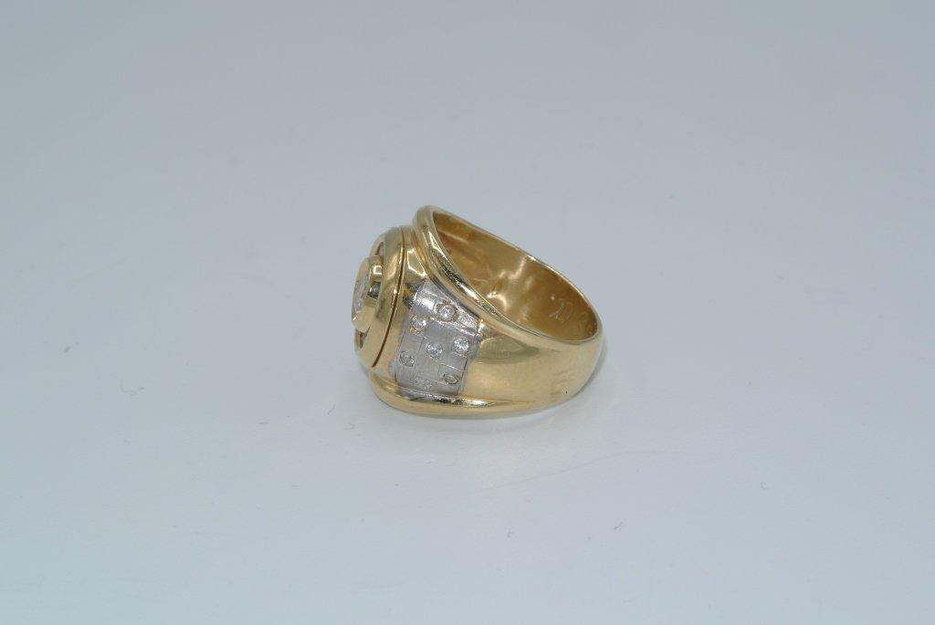 Gold colored ring with CZ stones Size 9 Men's gold colored metal ring with 14 CZ around one large CZ