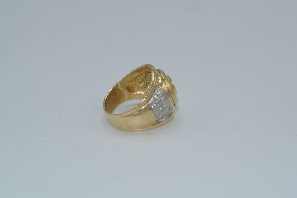 Gold colored ring with CZ stones Size 9 Men's gold colored metal ring with 14 CZ around one large CZ