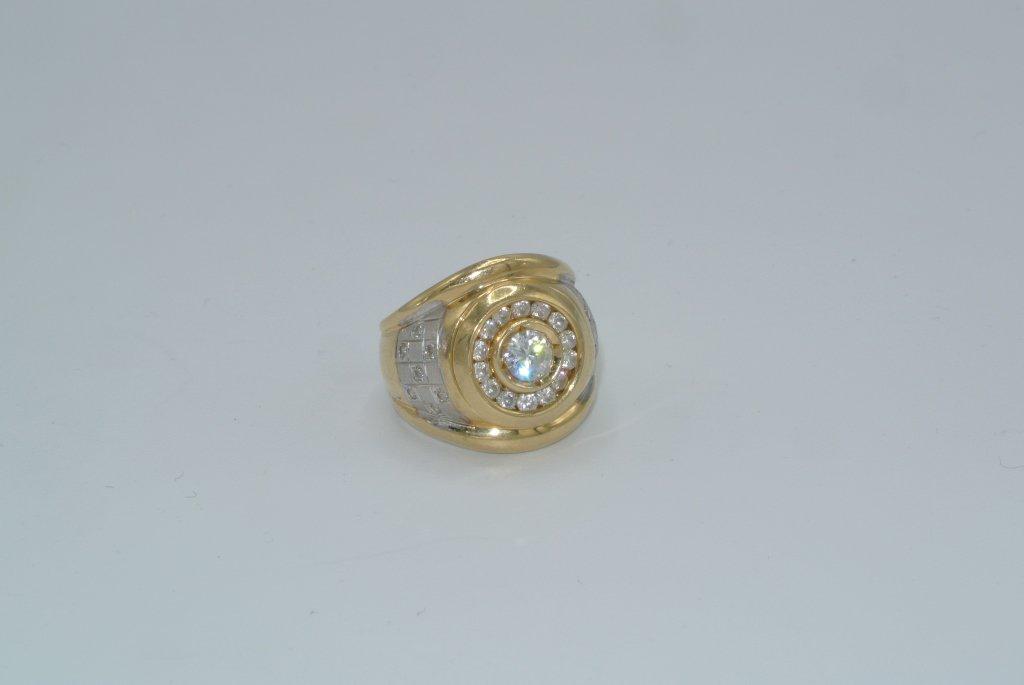 Gold colored ring with CZ stones Size 9 Men's gold colored metal ring with 14 CZ around one large CZ