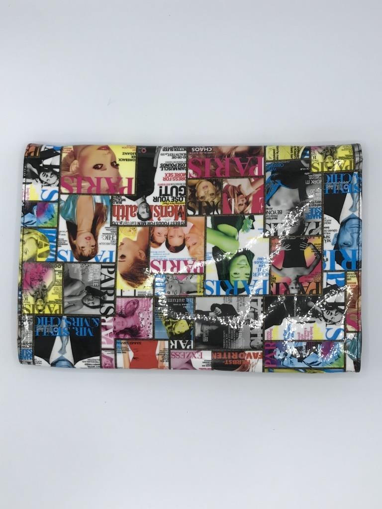 Necessary Paris Print Clutch Necessary Clothing Paris Vinyl Print Clutch. This clutch features an ar