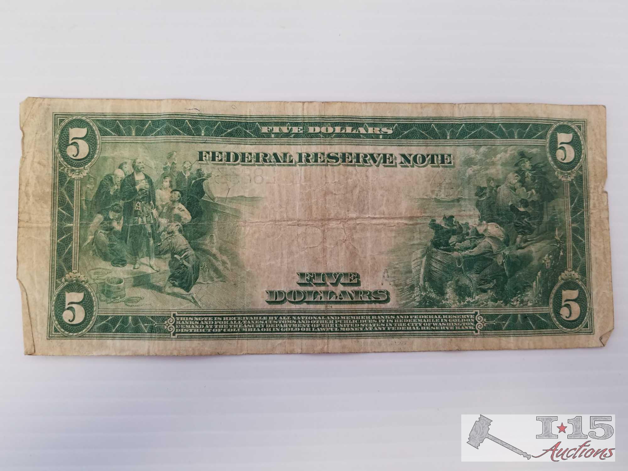 Old U. S. Paper currency and 1984 Olympic Coin