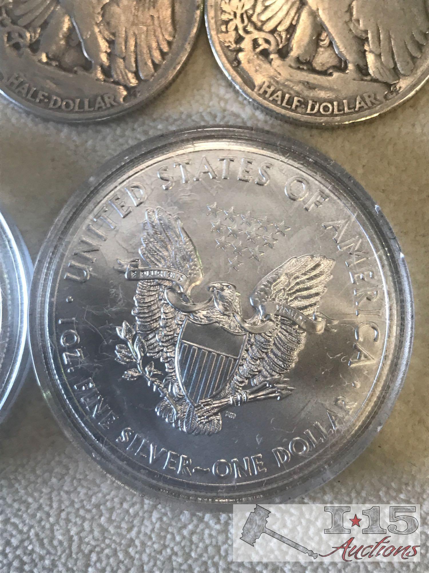 2 silver dollars, 7 silver half dollars and 1 silver quarter