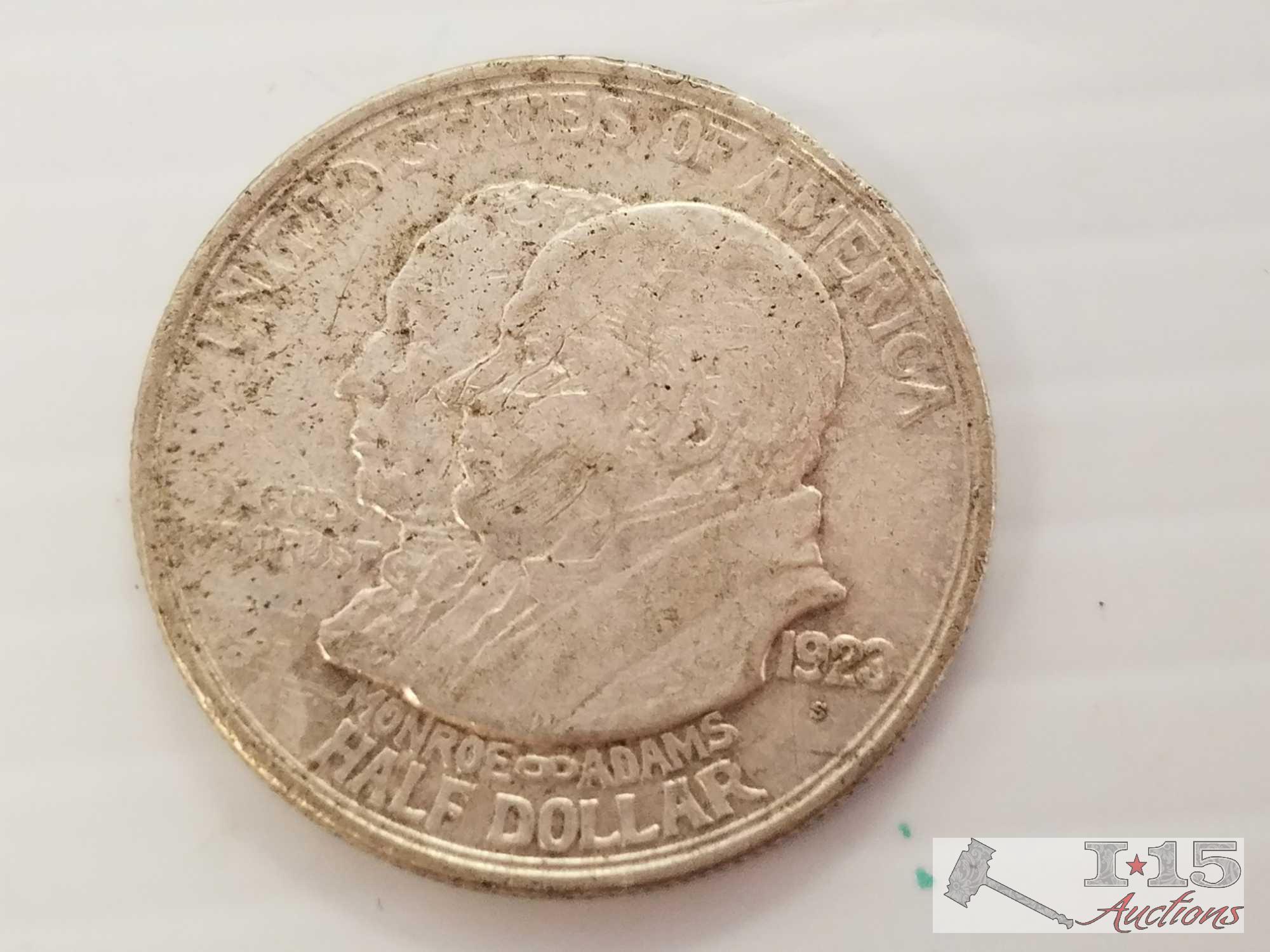 Two 1923 Monroe Adams Centennial silver half dollars