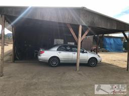 Barn with 5 stalls, bathroom and carport