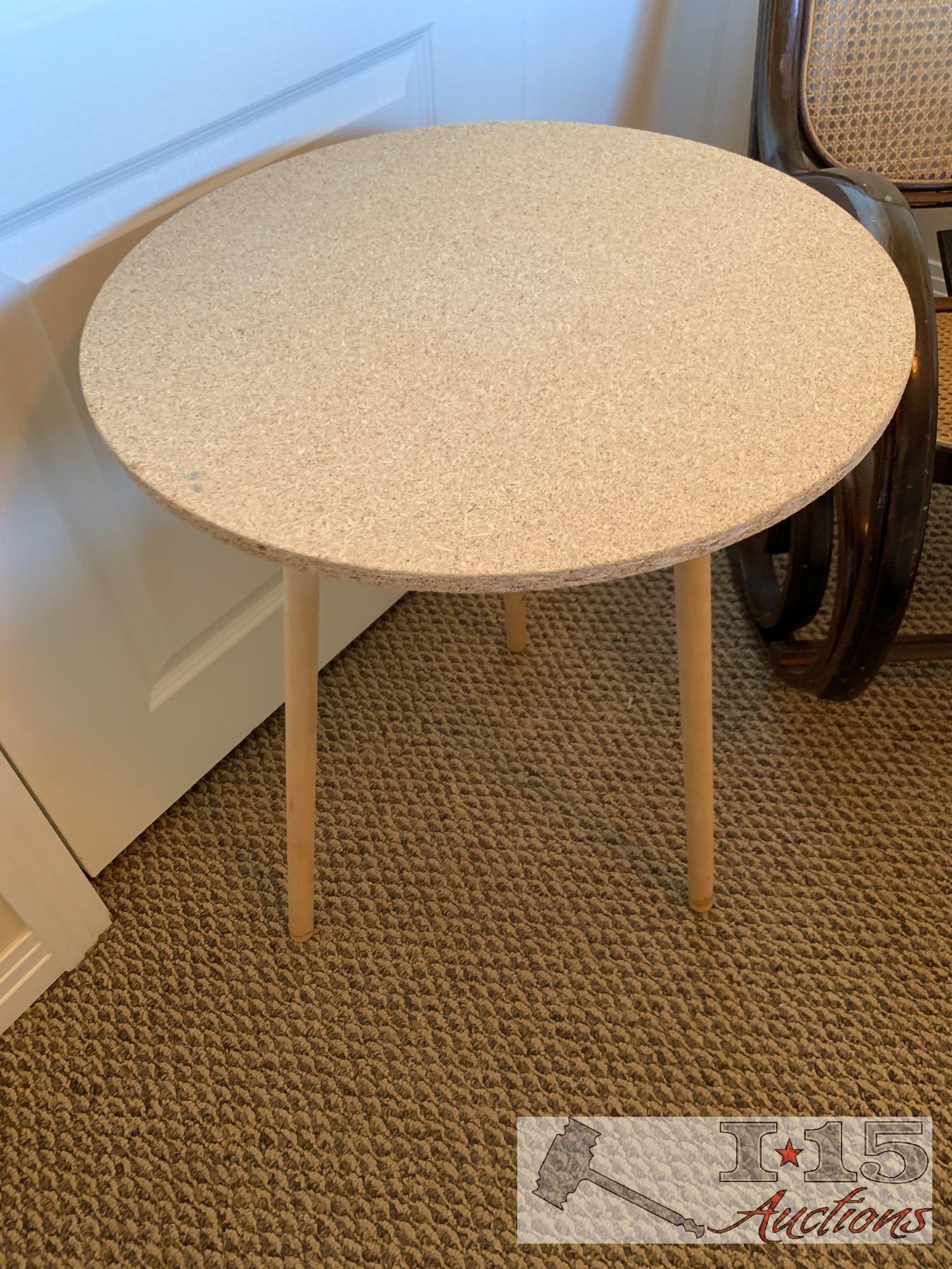 Wooden rocking chair with end table.