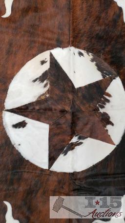 Cowhide rug with longhorn and star design.