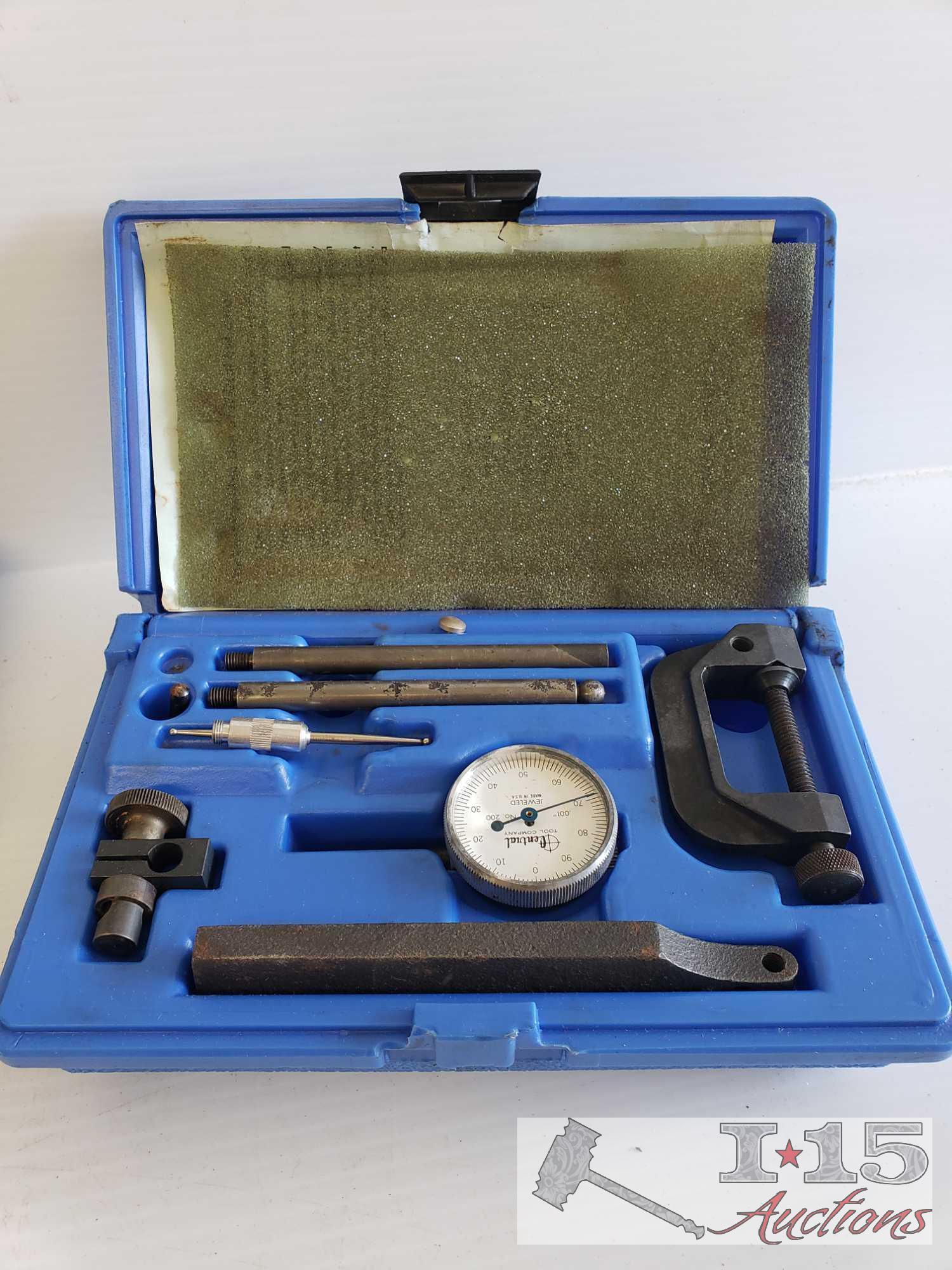 Four Calipers, Japan Micrometer, and a Central Universal Dial Test Indicator