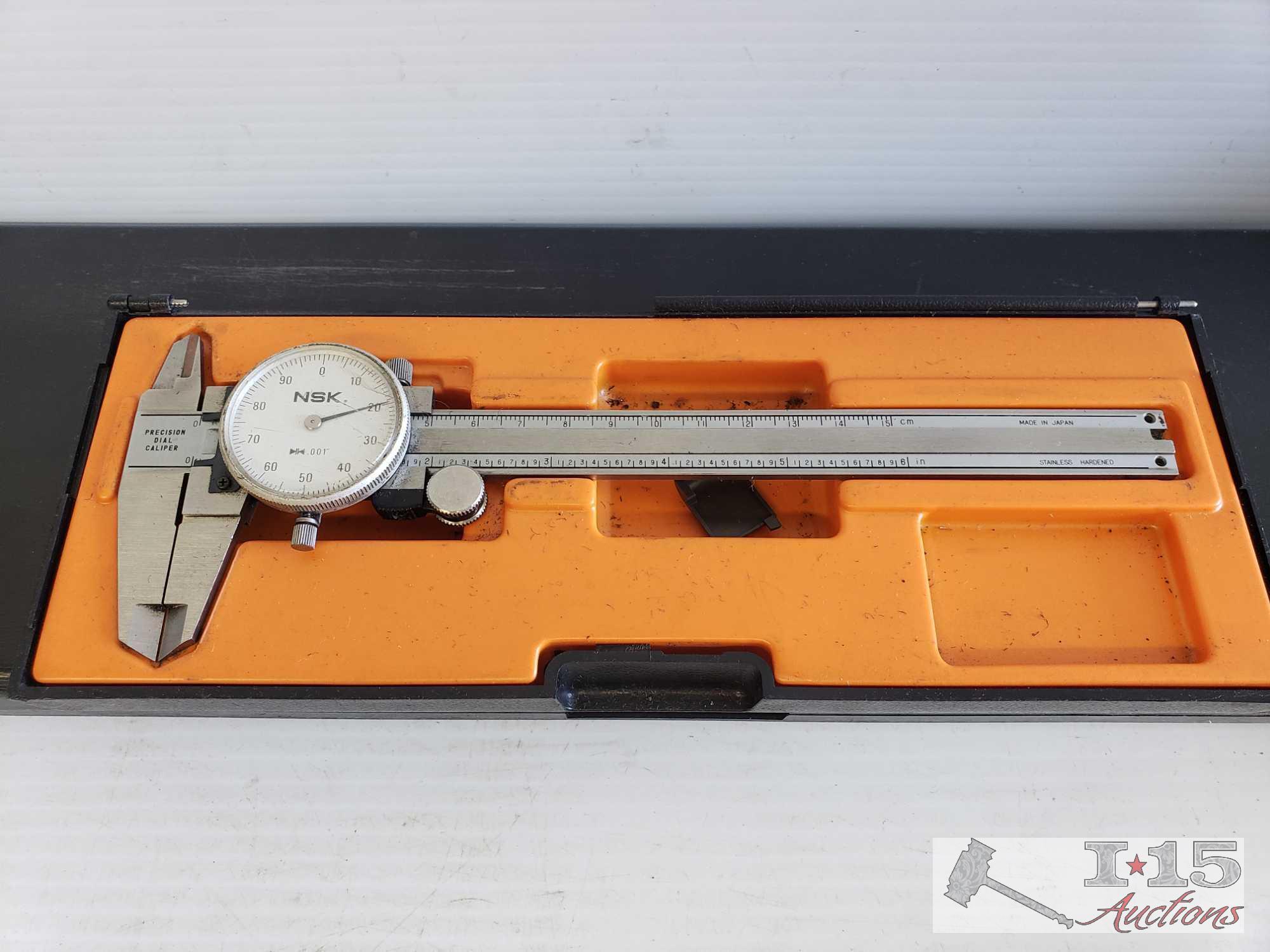 Four Calipers, Japan Micrometer, and a Central Universal Dial Test Indicator