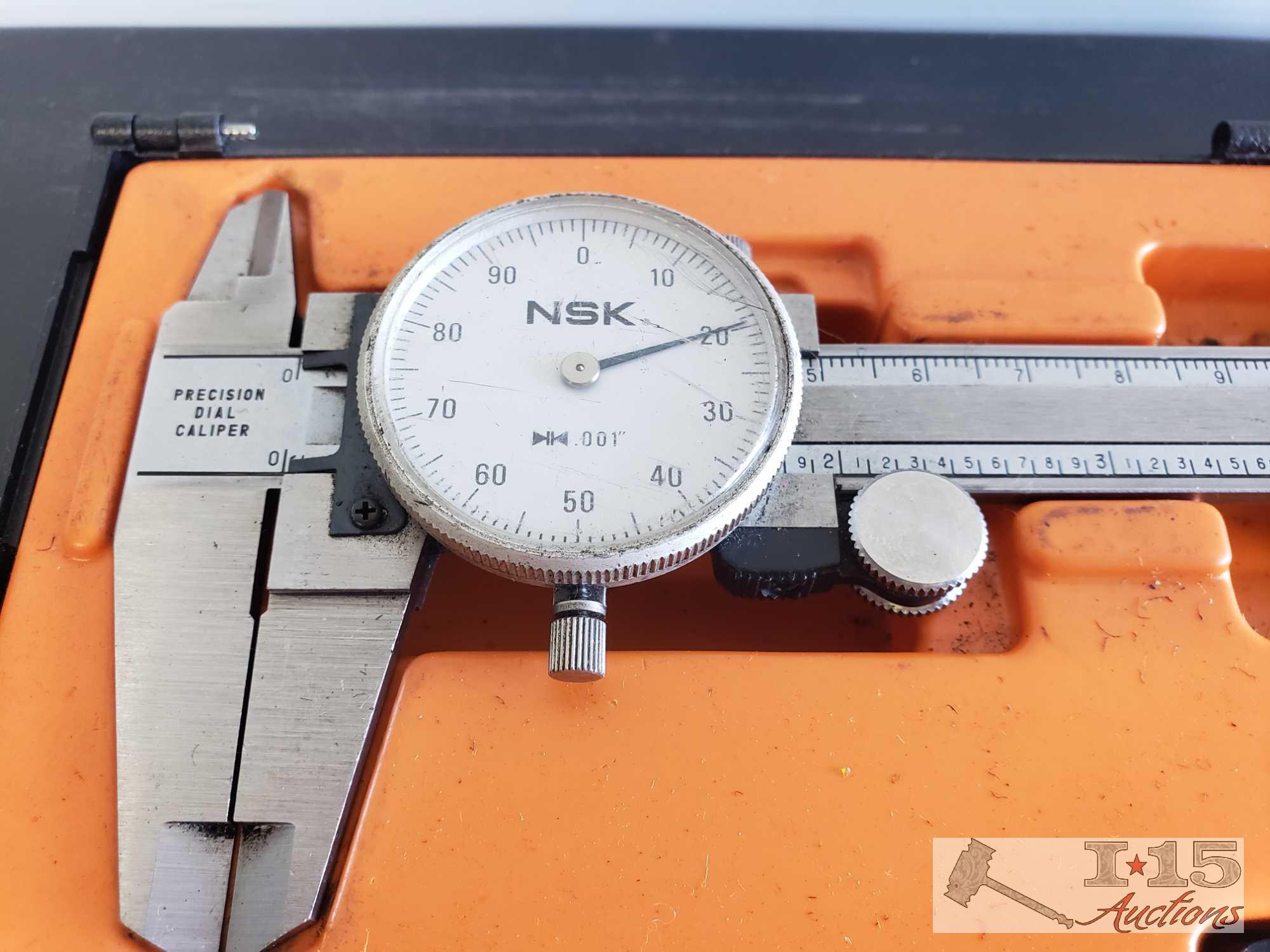 Four Calipers, Japan Micrometer, and a Central Universal Dial Test Indicator