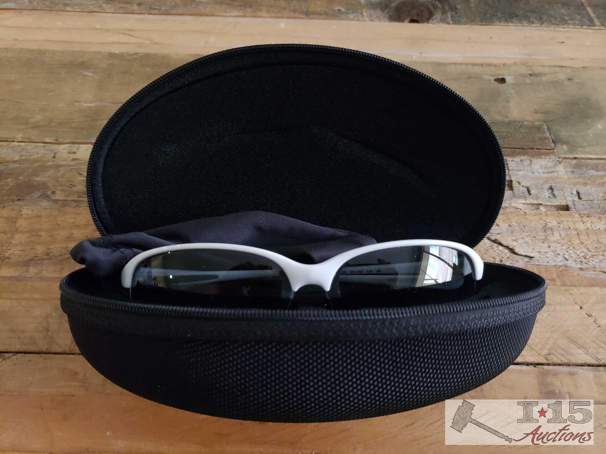 Pair of Ray-Ban Sunglasses and Pair of Oakley Sunglasses