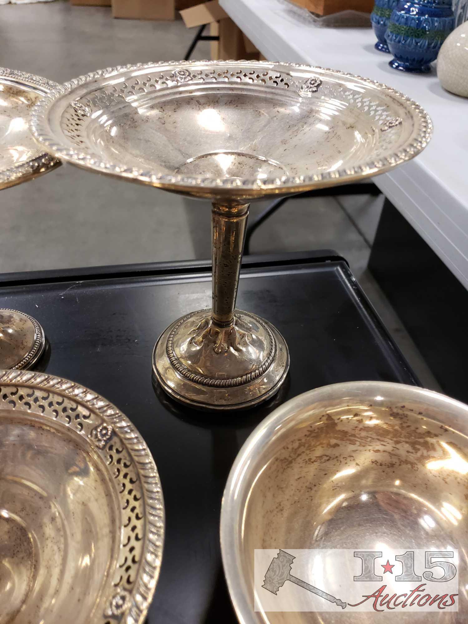 4pieces of Sterling silver Plates, candy dishes weighs 424 plus 4 pieces with weighted bases