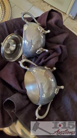 Silver plated serving trays, tea set, chafing dishes and bed warmer with coal burner!