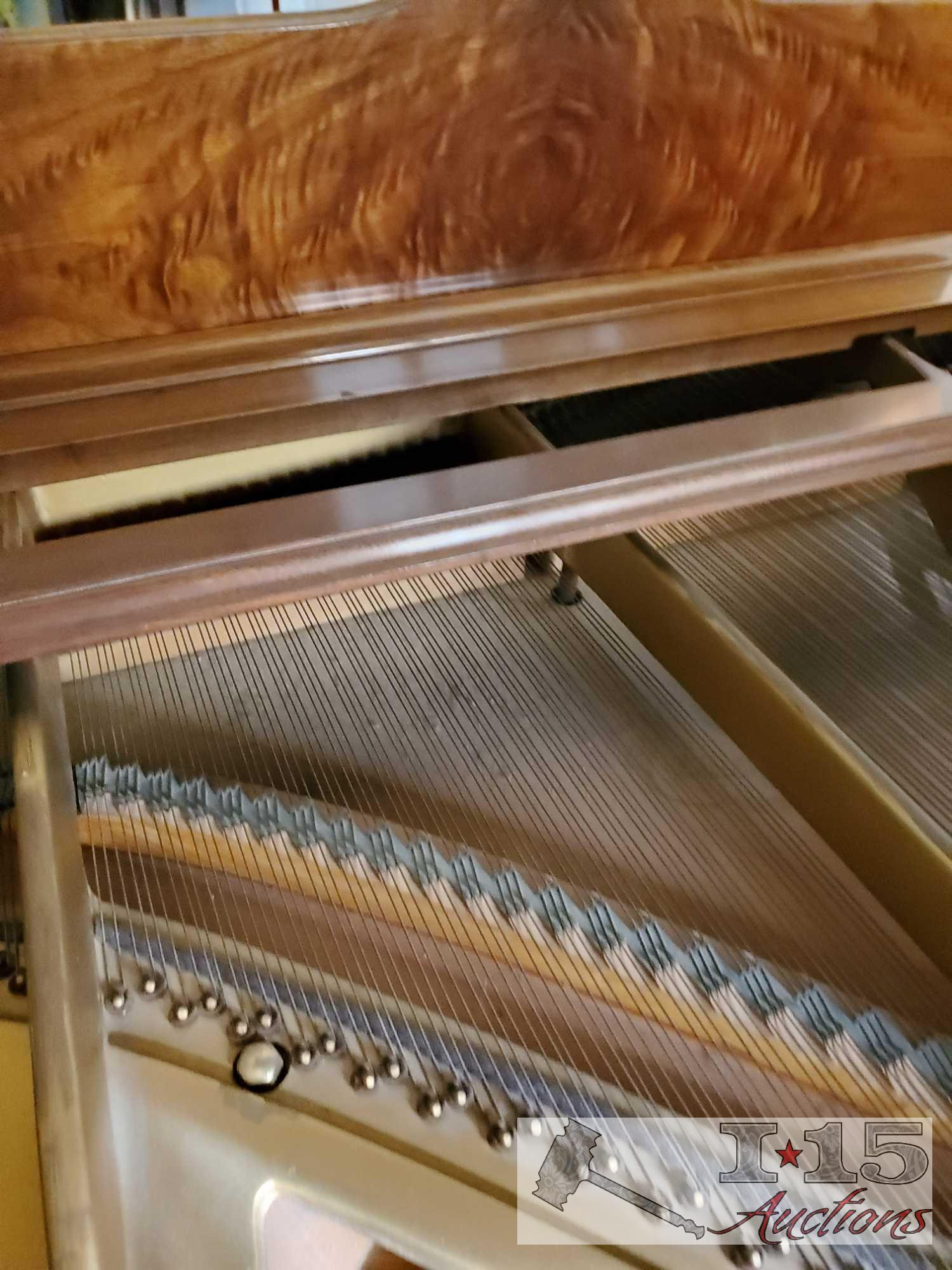 A 1937 Chickering Baby Grand Piano