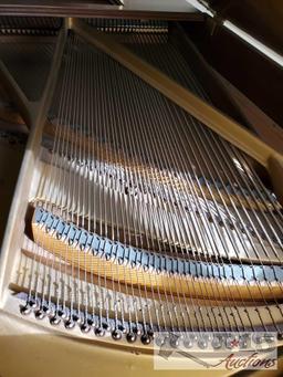 A 1937 Chickering Baby Grand Piano