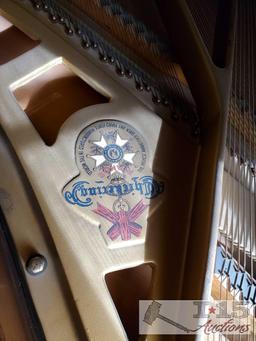 A 1937 Chickering Baby Grand Piano