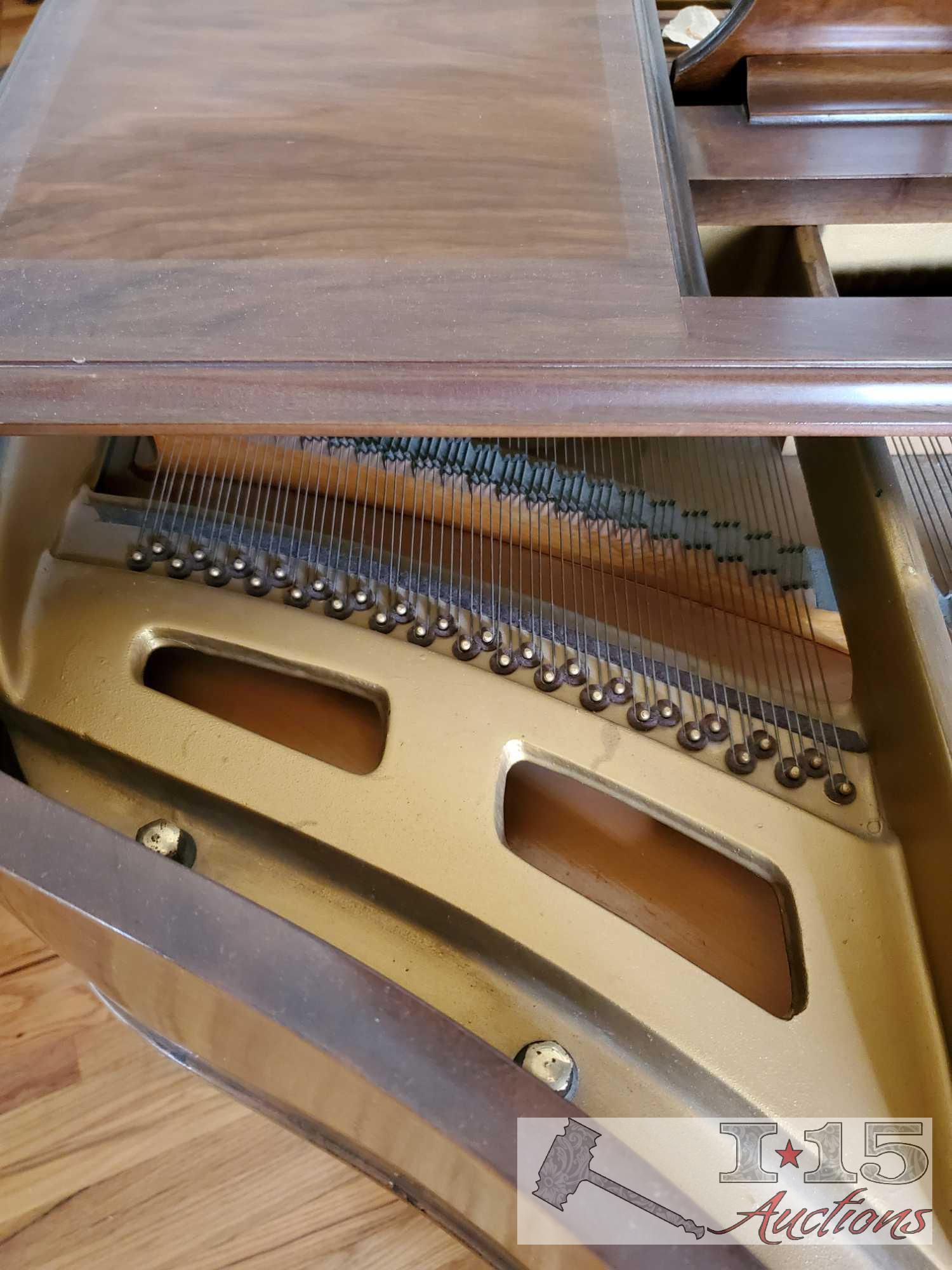 A 1937 Chickering Baby Grand Piano